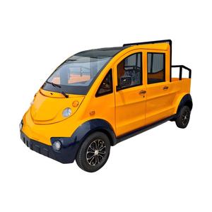 Voiture de patrouille électrique à quatre roues, couleur orange avec garnitures noires et plateau de chargement ouvert - Product Image 2