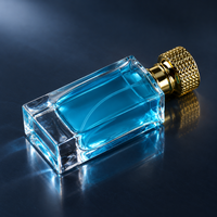 Flacon de parfum rectangulaire en verre personnalisé de 50 ml avec base épaisse et capuchon doré texturé pour l'emballage de parfums