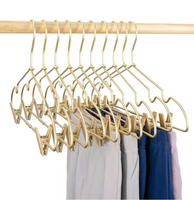 Cintre d'usine en métal doré avec pinces, vente en gros, pas cher, best-seller pour vêtements