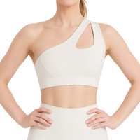 Soutien-gorge de sport asymétrique à découpes, avec bretelles et coussinets amovibles, pour femme, idéal yoga, gym, course à pied, en nylon et élasthanne, commande en gros