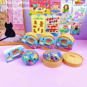 Vente en gros usine : Jouet sensoriel anti-stress TPR Squishy en forme de boulette avec visage souriant, Boîte mystère surprise à paillettes pour adultes - Product Image 1