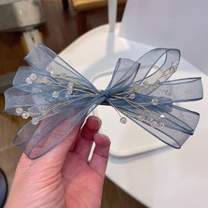 Vente en gros de pinces à cheveux en maille pour filles, nœuds en ruban de tulle, nœuds élégants de style Mori Girl pour femmes, accessoires pour cheveux - Product Image 4