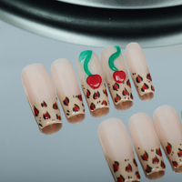 Uñas artificiales hechas a mano, patrón de leopardo largo, cereza pequeña tridimensional, fábrica reutilizable de alta calidad al por mayor.