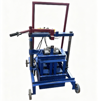 Machines à fabriquer des briques manuelles mobiles de type poussée 2-45A, équipement motorisé pour blocs de béton avec compatibilité 220V/380V
