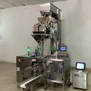 Machine d'emballage automatique de sachets préremplis pour granulés et poudres, scelleuse Doypack en ligne droite avec aspiration et purge d'azote - Product Image 1