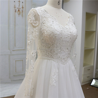 Classique A-ligne col en v robe de mariée Sequin dentelle Applique à manches longues chapelle Train à lacets dos Illusion princesse taille mariée