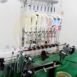 12 buses huile lubrifiante peser la distribution de liquide 2 têtes jus bière bouteille en verre machine de remplissage volumétrique avec capsuleuse 1 ensemble - Product Image 4