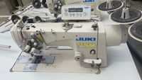 Machine à coudre industrielle d'occasion Juki LH-3568A-7 à double aiguille, plate, semi-sèche, avec coupe-fil automatique