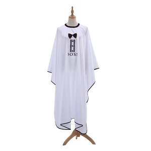 Mantella da Barbiere/<span class=keywords><strong>Parrucchiere</strong></span> Antistatica e Resistente all'Acqua di Alta Qualità, Nuovo Design, Bianca in Nylon Poliestere con Fiocco, per Salone di Bellezza - Product Image 1