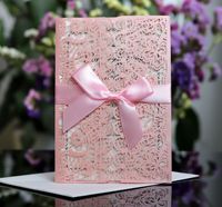 Carte d'invitation à motif floral laser bleu marine avec nœuds en ruban
