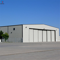Bâtiments Préfabriqués Économiques Entrepôt à Structure en Acier Cadre Métallique Hangar d'Avions Aérogare Abri Bâtiments en Acier Léger