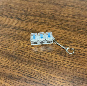 Bouton transparent anti-stress DIY, porte-clés clavier jouet anti-stress, clé anti-stress lumineuse à 4 touches - Product Image 4