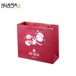 Custom Logo Merry Christmas Paper Gift Bags Santa Print Red Recyclable Paper Tote Bag With Handles Holiday Present Packaging - Product Image 1