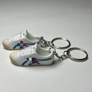 พวงกุญแจรูปรองเท้าไทเกอร์ 3 มิติ แบบโปร่ง รุ่นแฟชั่น  ของตกแต่งรูป<span class=keywords><strong>รองเท้า</strong></span>  จี้บรูซ <span class=keywords><strong>ลี</strong></span>  <span class=keywords><strong>รองเท้า</strong></span>กังฟูสีเหลือง  <span class=keywords><strong>รองเท้า</strong></span><span class=keywords><strong>ผ้าใบ</strong></span>ผู้ชาย - Product Image 4