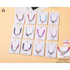 Set di 12 Braccialetti con Ciondoli in Acciaio Inossidabile, Gioielli Colorati con Charm, Regalo per Donne e Ragazze, Accessorio di Moda - Product Image 1