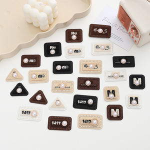 Erkoumi Popular Custom Patches Embroidered Christmas Fashion Style Embroidery Patch Pearl Iron on Patches for Letter Label Decor - Product Image 1