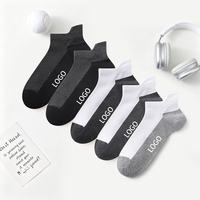 Minghui peut personnaliser les chaussettes à la mode assorties à blocs de couleurs pour hommes et femmes et les vendre en gros