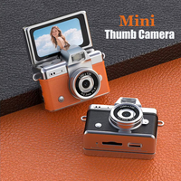 Mini appareil photo numérique de poche 180 °   Mini-caméra portable pour enfant avec écran rotatif pour selfie, flash et multiples filtres, format porte-clés