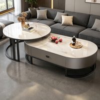 Table basse ovale moderne de luxe léger, plateau en pierre frittée avec tiroirs de rangement pour salon