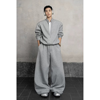 Nouvel ensemble deux pièces tendance pour homme, style coréen, col montant, pull ample et pantalon décontracté, collection Printemps-Automne 2026