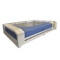 El diseño compacto de Julong ocupa un espacio mínimo de escritorio mini 1390 1610 máquina de grabado de corte láser CO2 para tela acrílica de madera