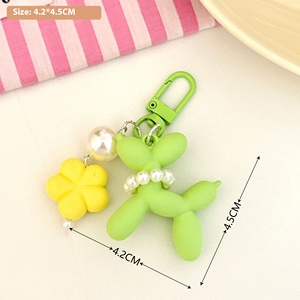Globo de dibujos animados perro llavero Kawaii colorido suave Pvc auricular caso bolsa encanto accesorios encantador flor perro globo llavero - Product Image 3