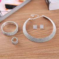 Ensemble de bijoux de mariée européen et américain très vendu - Collier à griffes en strass, boucles d'oreilles, bracelet, diadème - Accessoires en gros