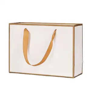 Gold edge eco-friendly packaging flexiloop handle white bags custom LOGO small jewellery shopping paper bag