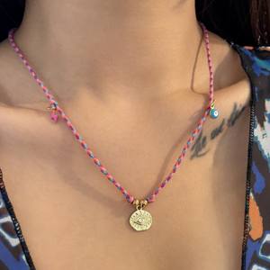 Collier de fête en acier inoxydable plaqué or 18 carats avec logo personnalisé, chaîne fouet et perles, vente en gros - Product Image 5