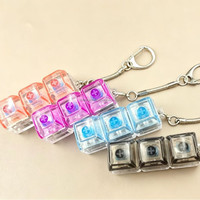 Tragbares, individuell gestaltetes, kreatives Multifunktions-Stressabbau-Spielzeug: Leuchtende LED-Klick-Fidget-Schlüsselanhänger