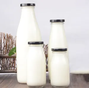 زجاجات KDG زجاجية لحليب الشرب بأحجام مخصصة 200 مل 250 مل 500 مل 32 أونصة مزودة بأغطية زجاجات الحليب بالجملة