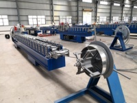 Machine de façonnage de cadre de porte de volet roulant de profil en acier