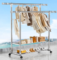 Nouveau design en acier inoxydable 2 couches télescopique Double tige porte-vêtements sac mobile étendoir pour chambre balcon matériau métallique