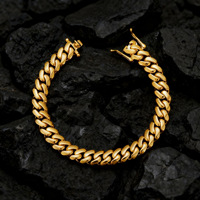 Chaîne de collier et bracelet cubain unisexe en acier inoxydable plaqué or PVD avec fermoir mousqueton, finition dorée polie, pour hommes