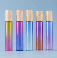 Flacon en verre dégradé/transparent de 5 ml et 10 ml avec bille en acier et couvercle noir/à motif bois pour l'emballage d'huiles essentielles/parfums