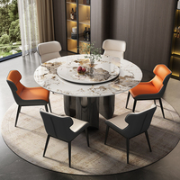 Table à manger ronde moderne avec plateau en pierre frittée et structure métallique réglable, 8 places, design luxueux, construction durable