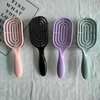 2023 boucle personnalisée démêlant brosse à cheveux moderne 12 pagaie peigne forme ovale poils de sanglier rembourré Compact bouclés pagaie Logo personnalisé