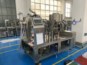 Automática de vacío rotativa de bolsa de retorta máquina de embalaje para atún pescado carne Pickles de embalaje - Product Image 4
