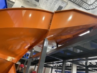Système de chemin de descente en spirale industriel Truelisort pour une manutention efficace des colis et un flux continu de matériaux dans les entrepôts de distribution