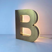 Lettres lumineuses rétroéclairées durables en acier inoxydable à économie d'énergie pour enseignes murales extérieures suspendues de bâtiments