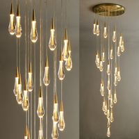 Lustre moderne de luxe pour escalier en colimaçon, suspension longue en verre doré en forme de goutte d'eau pour hall de villa, duplex ou bâtiment à plafond haut