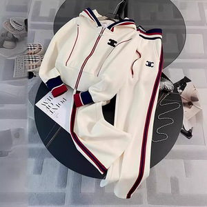 Ensembles <span class=keywords><strong>de</strong></span> <span class=keywords><strong>sport</strong></span> décontractés pour femmes Printemps Automne Nouveaux vêtements Mode <span class=keywords><strong>Pull</strong></span> à capuche rayé et pantalon droit Ensemble - Product Image 1