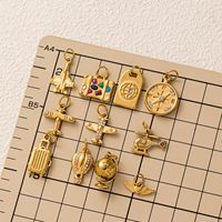 YML&Travel Around the World Compas de voyage en acier inoxydable plaqué or 18K PVD, breloque globe DIY pour valise et livre