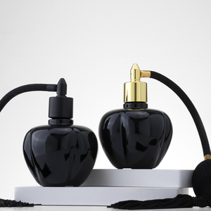 Vente en gros de 100ml de vaporisateur de parfum <span class=keywords><strong>vide</strong></span> en verre noir Design Apple avec airbag Style de luxe pour les parfums - Product Image 1