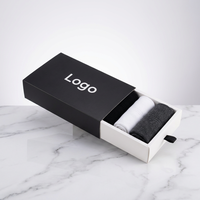 Boîte d'emballage pour vêtements en carton recyclable avec logo personnalisé OEM, finition mate, pour la vente en gros de marques.