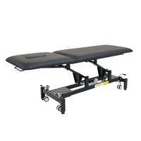 Table de massage électrique réglable en acier inoxydable moderne et luxueuse, design pliable pour salons de beauté commerciaux, cliniques médicales
