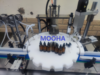 Machine de remplissage, de bouchage et d'étiquetage de flacons en verre liquide CE 1000-2000 bph, machine de remplissage et de bouchage de compte-gouttes pour huiles essentielles 10 ml