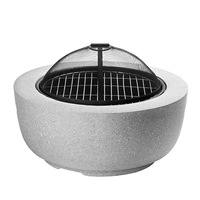 Chauffe-charbon d'extérieur moderne avec grille de cuisson de qualité alimentaire Cheminée à bois et foyer pour les repas en plein air