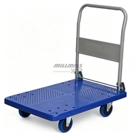 Chariot à plateforme à quatre roues en plastique pour le transport de colis dans les centres de distribution et entrepôts