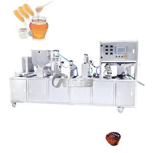 Fully automatic pudding cup filling sealing machine rotating plastic spoon packaging machine